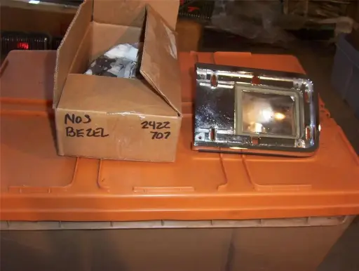 [0423-430-nos#] 1964 DODGE STATION WAGON DRIVER SIDE TAIL LIGHT HOUSING MOPAR NOS 2422707